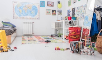 A cozy and colorful children's bedroom neatly organized with toys and books easily accessible.