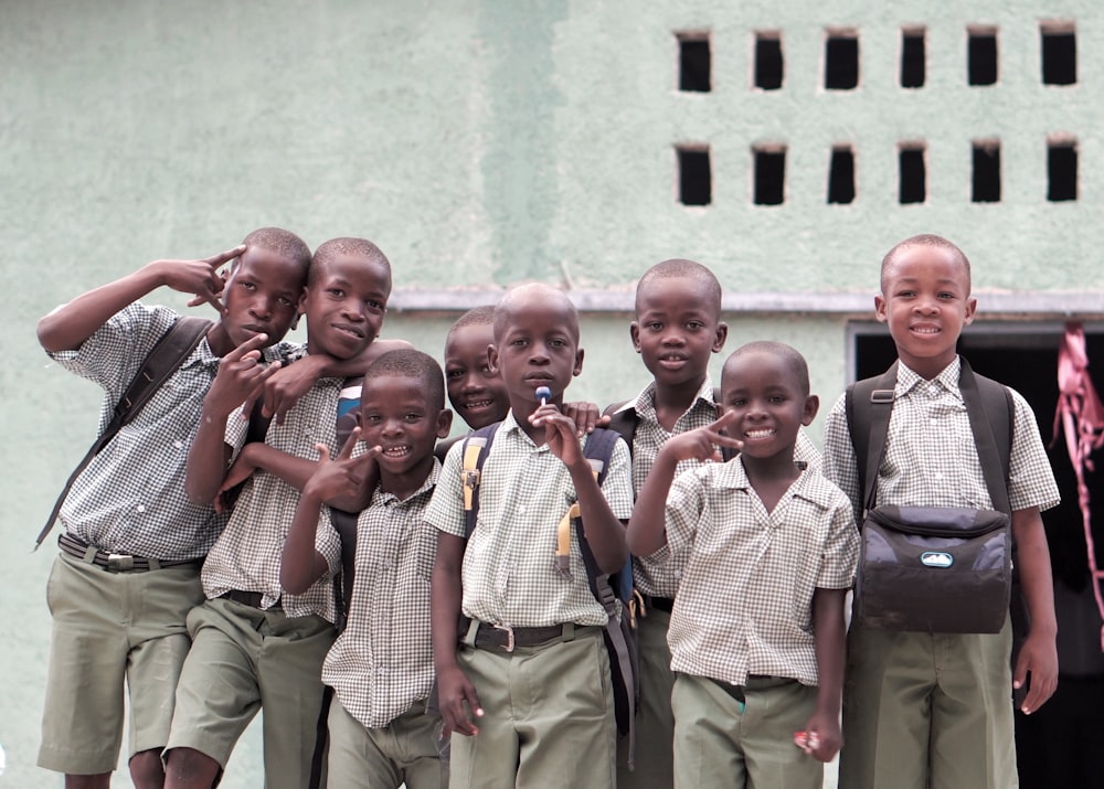 group of boy standing outdoor