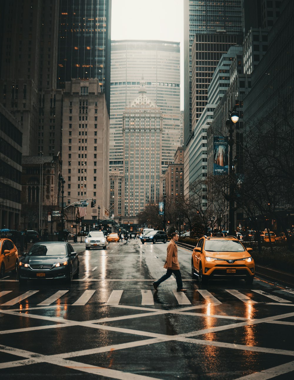 person crossing on street during daytime