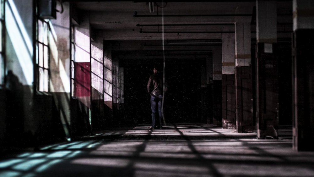 man standing in building