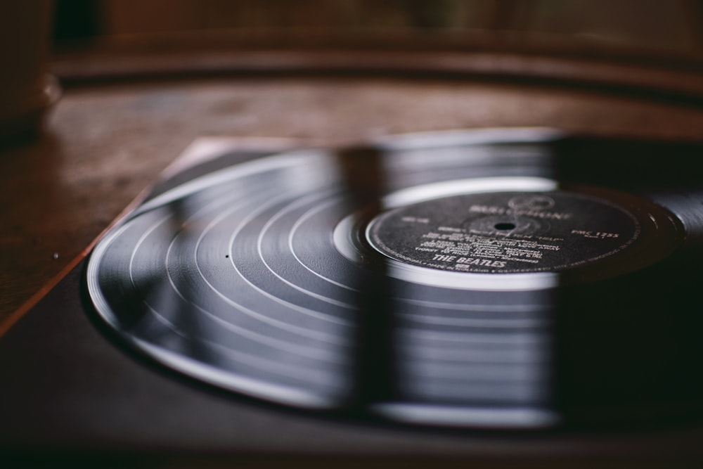 shallow focus photo of vinyl record