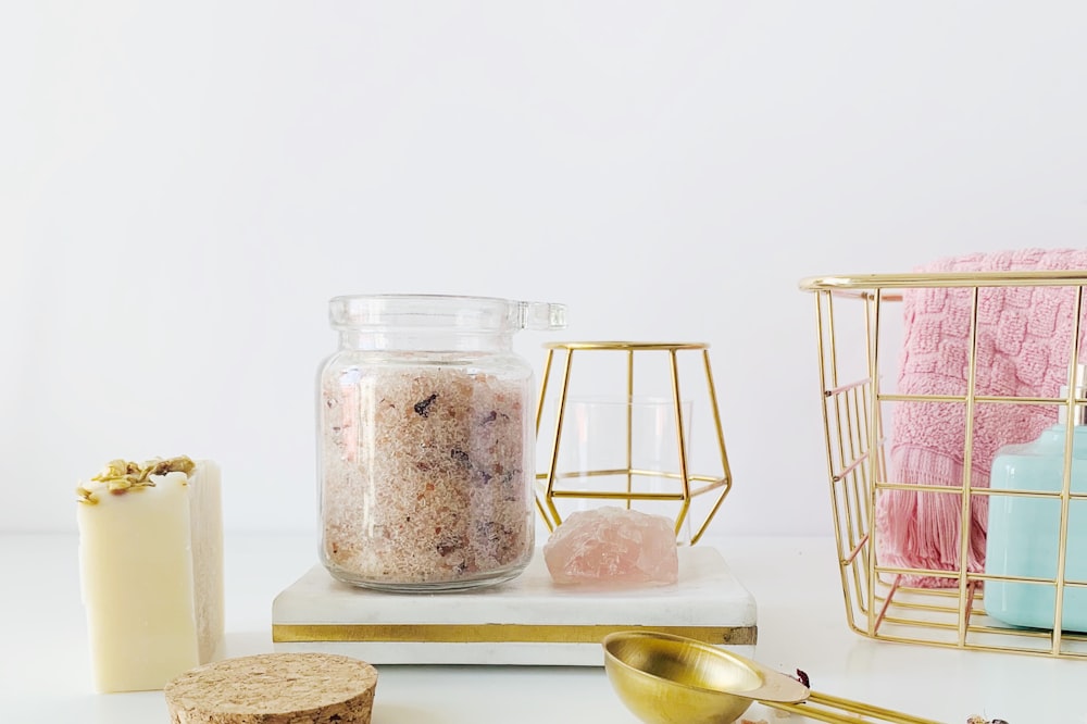 clear glass jar near white surface