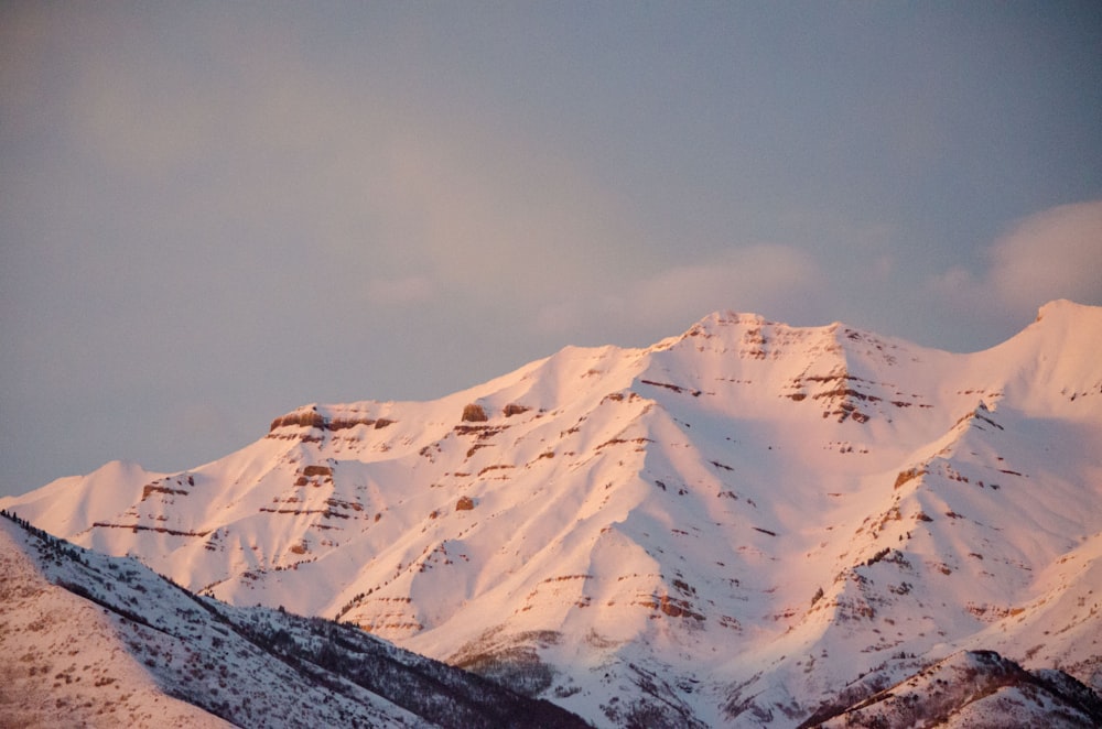 snow capped mountains under blue sky