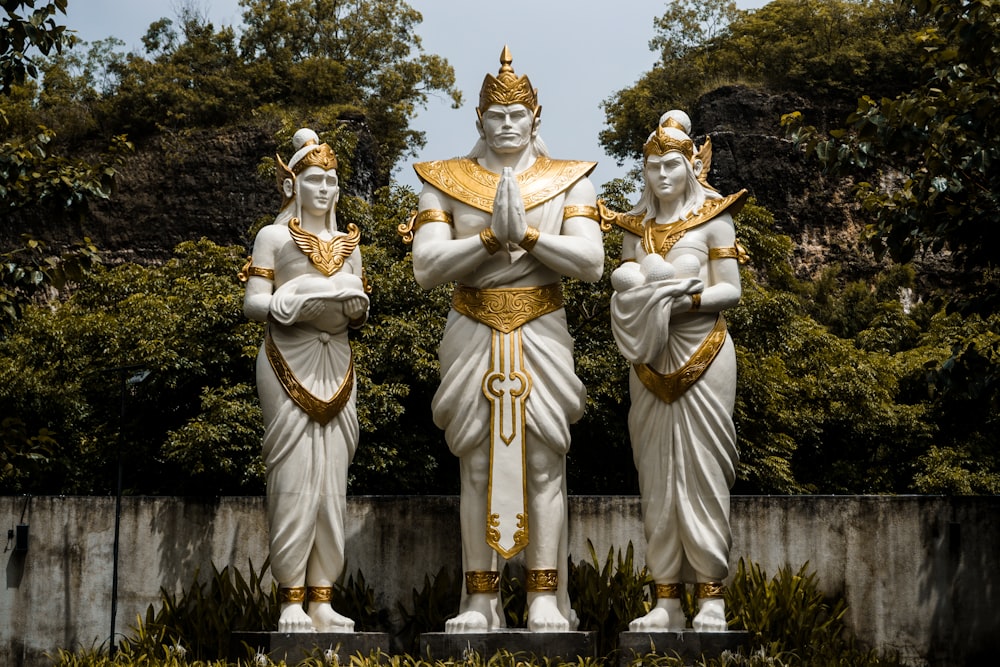 three Hindu deity statues