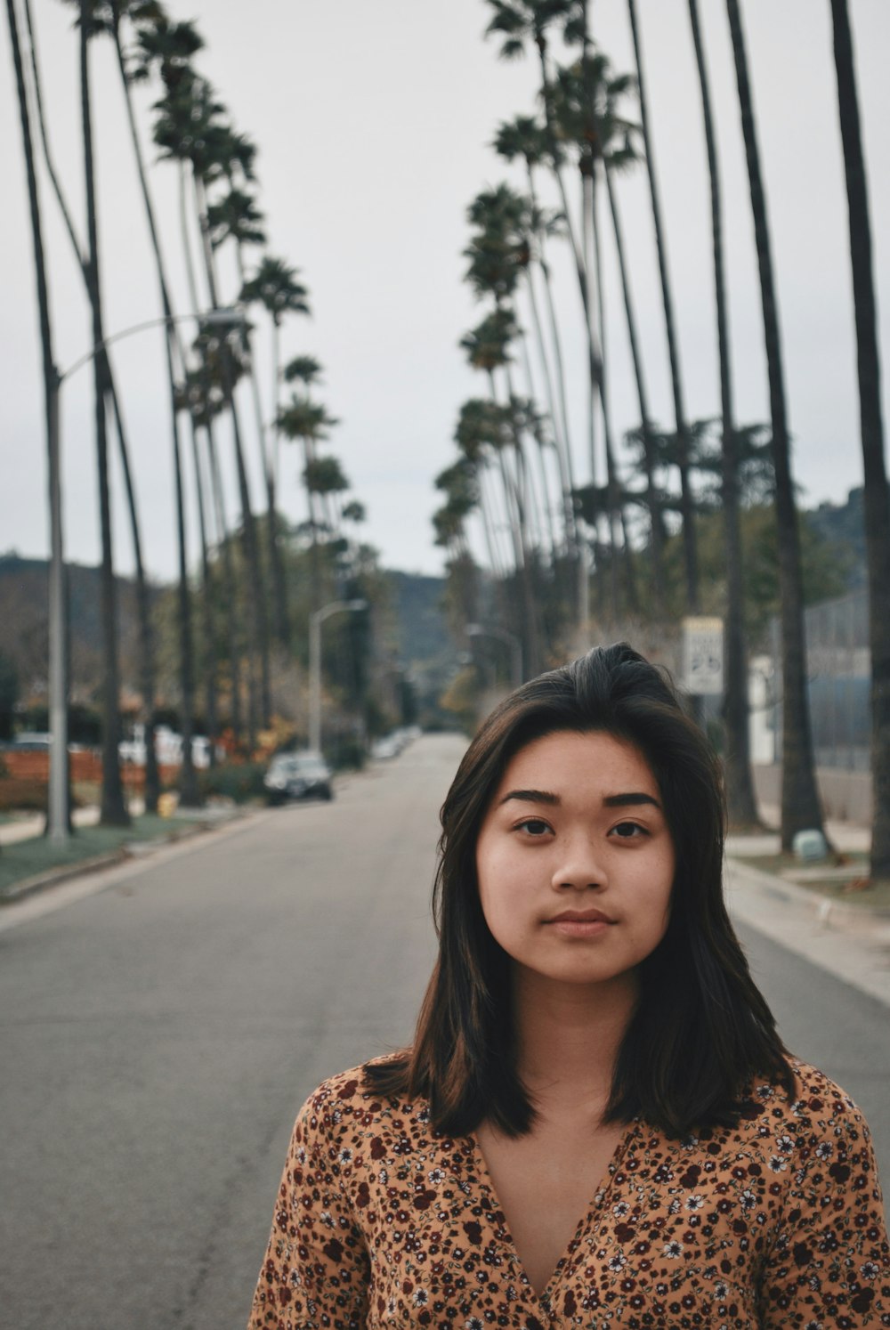 woman wearing floral dress at the street