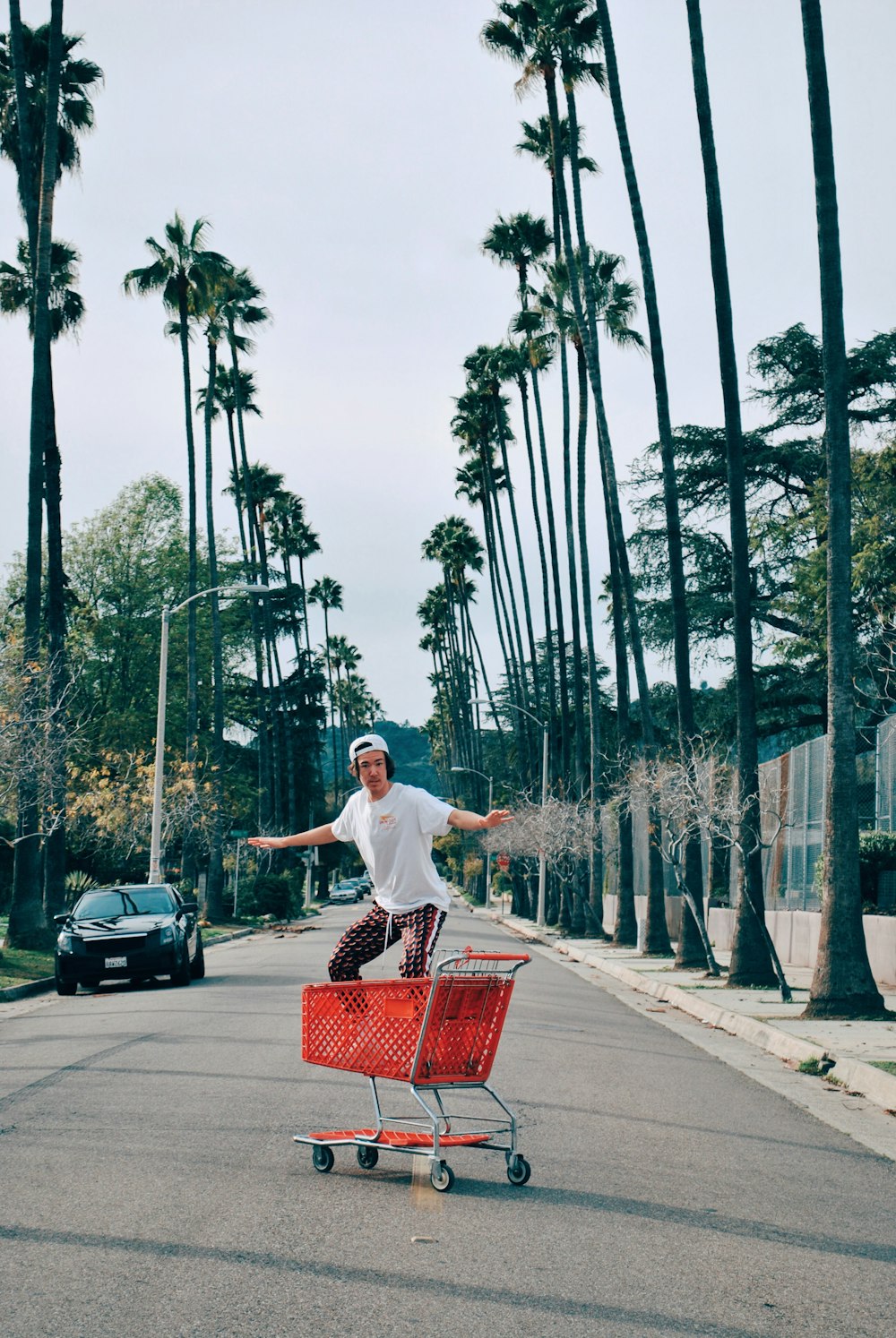 man on shopping car