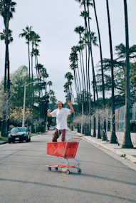 man on shopping cart