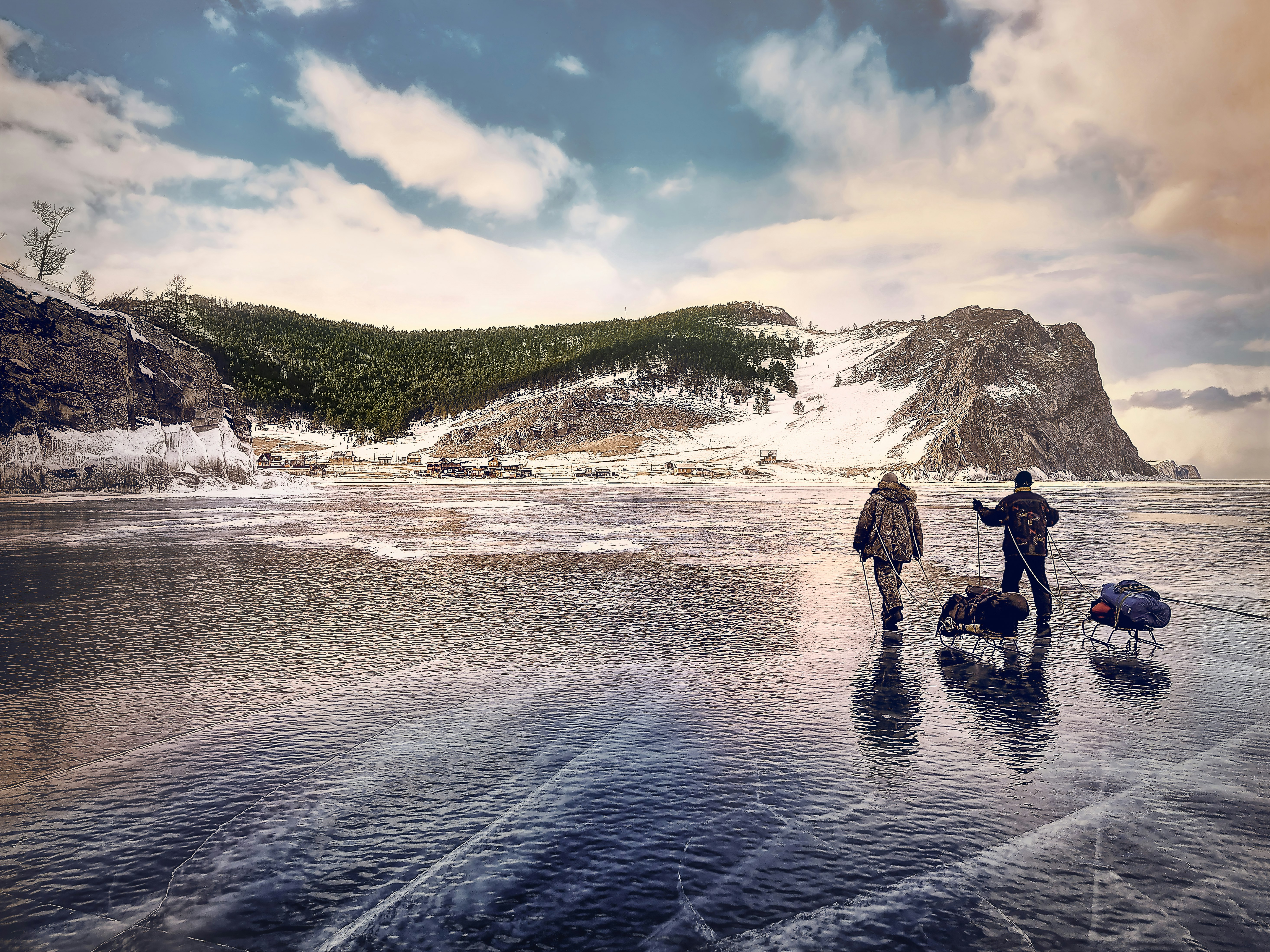 person walking near snow covered mountains