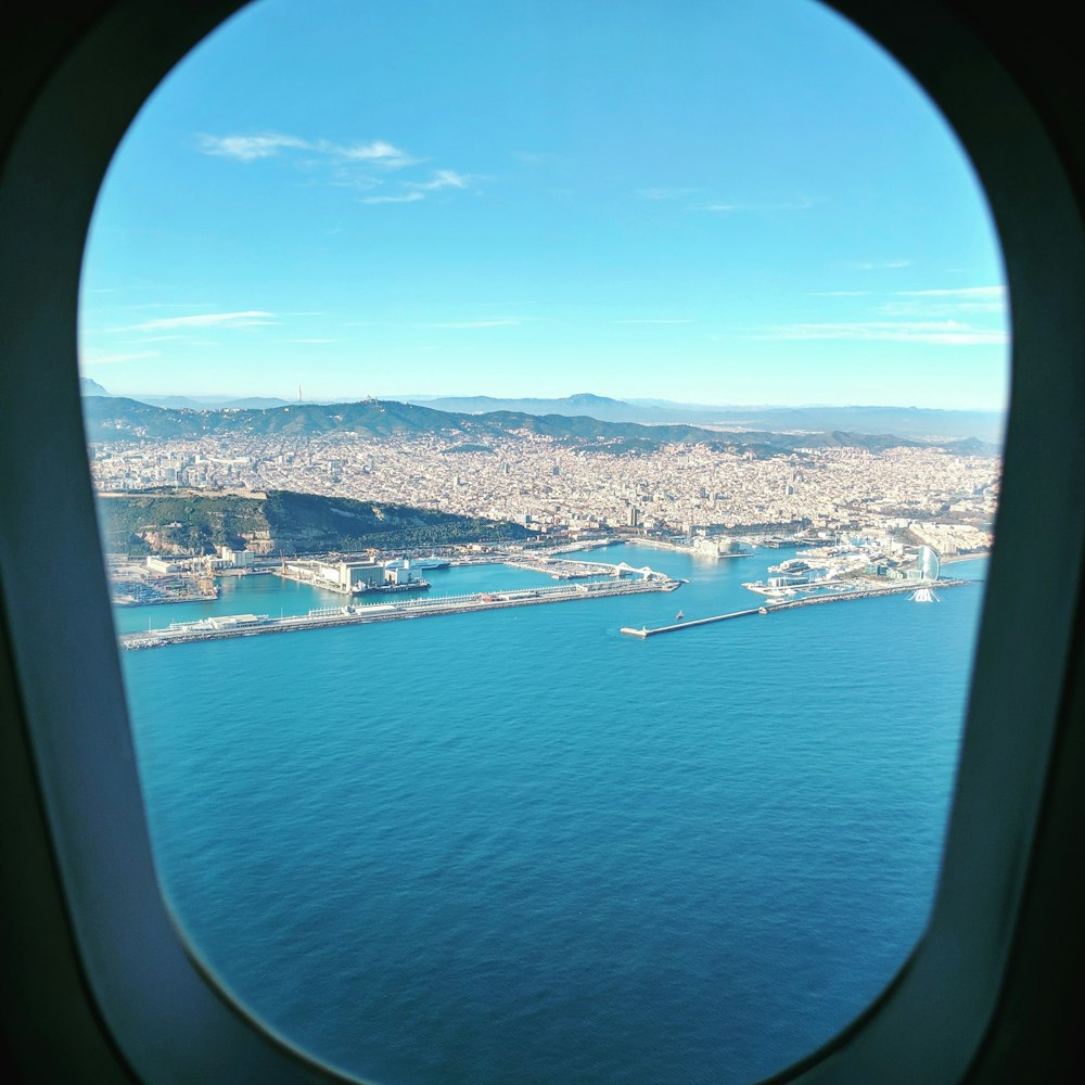 aerial photo of city buildings near body of water