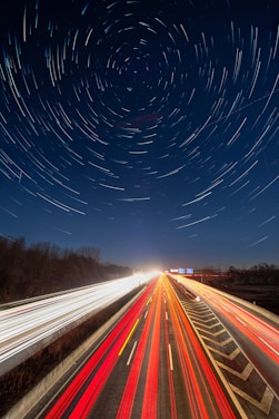 time lapse photography of cars on road