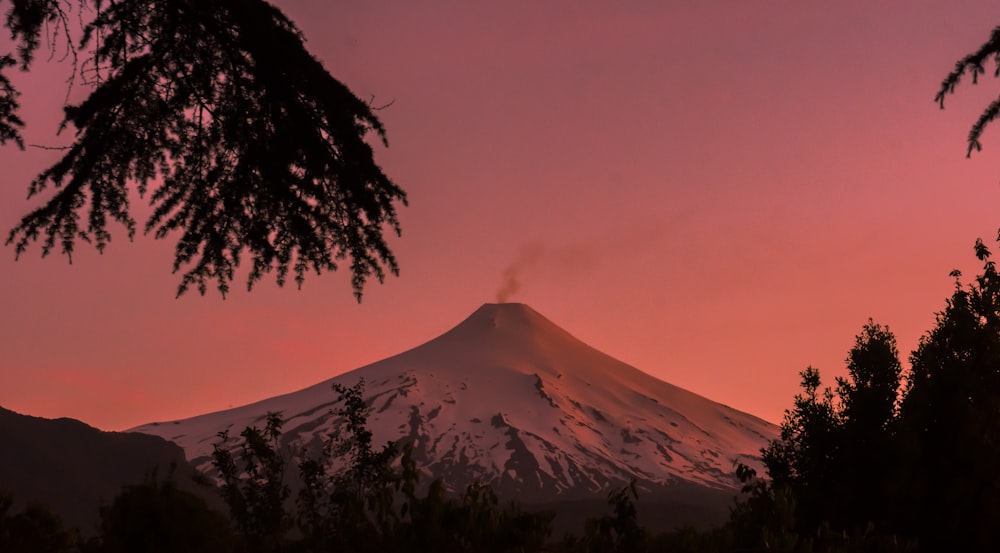 mountain covered with snow during golden hour