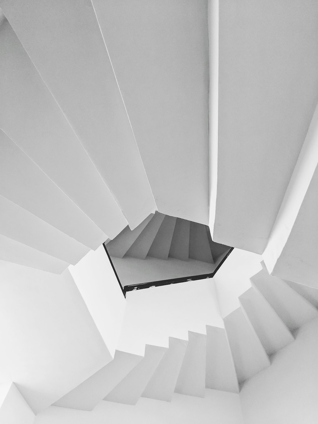 low angle view of white spiral stairs