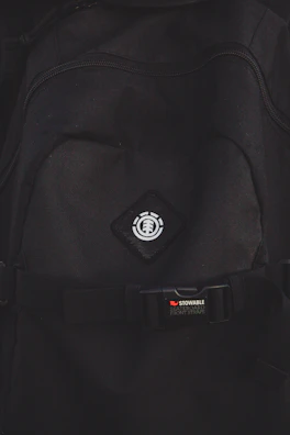 Emblem representing a backpack series with speed ratings highlighted.