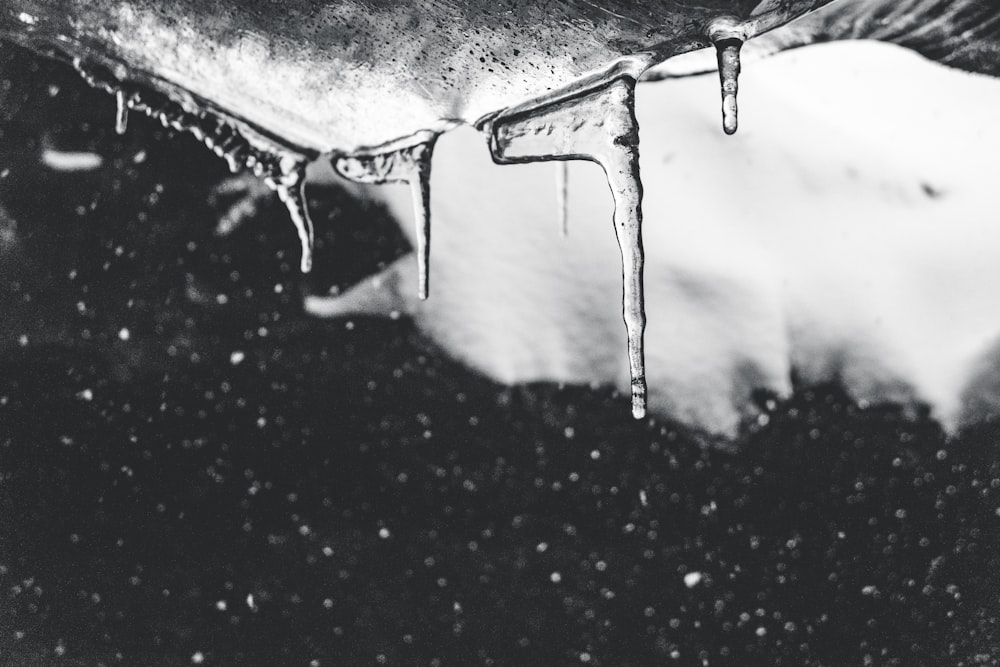 grayscale photo of ice