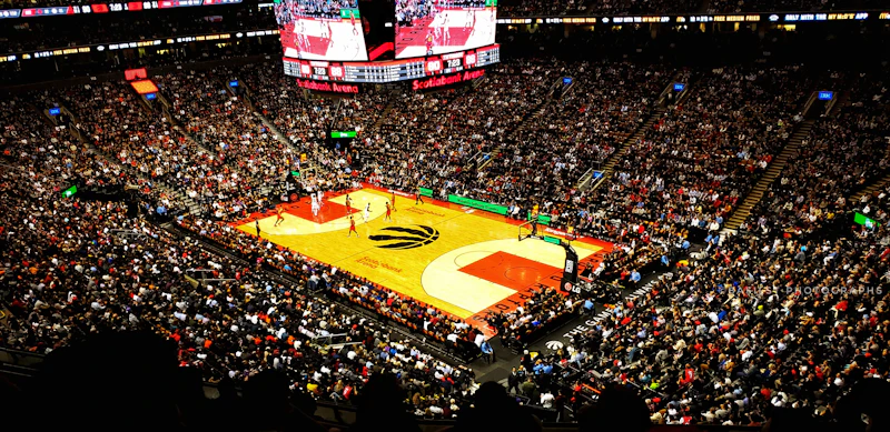 Basketball arena filled with fans during a game