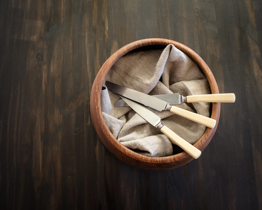 A set of wooden kitchen tools laid out on a counter