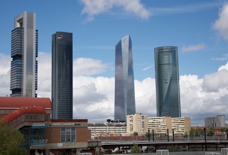 A scenic view of Madrid with a focus on modern office buildings and vibrant city life.