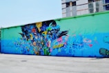 A vibrant street mural illustrating emerging tech and creativity.