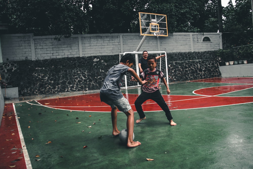 two boys playing tiger football