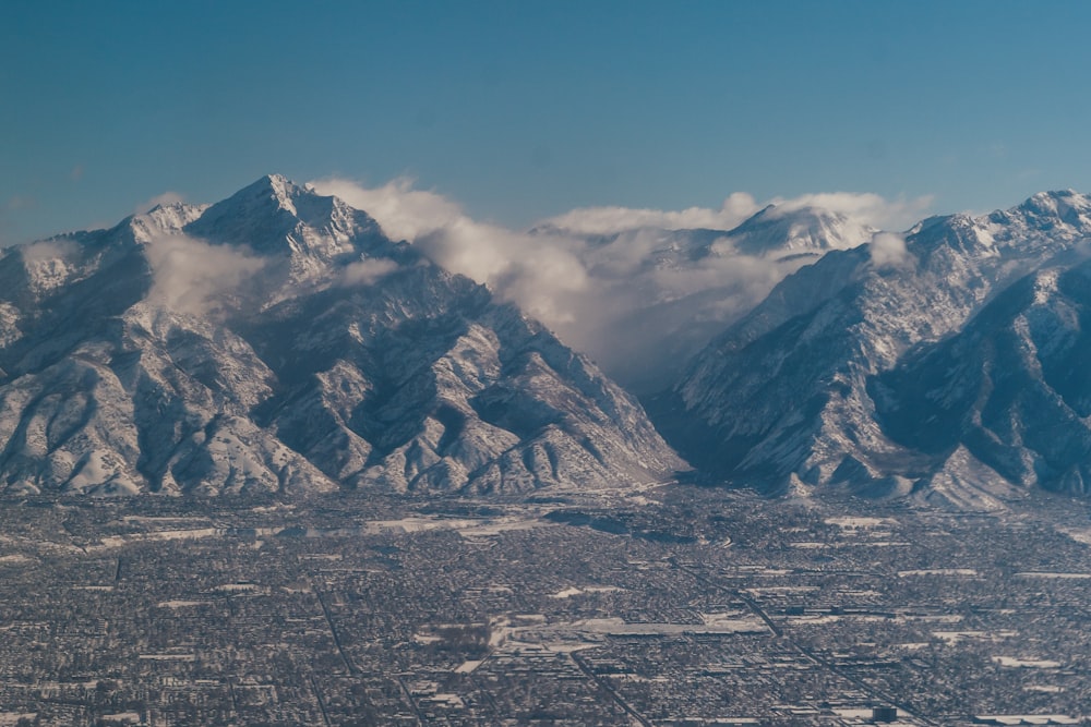 aerial photography of houses and buildings near mountain