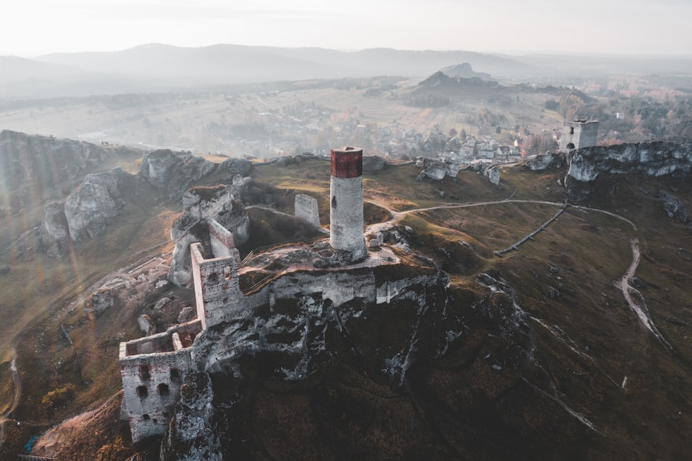 aerial photography of structure on top of mountain