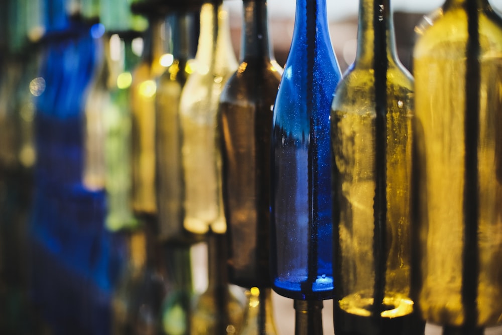selective focus photography of glass bottles