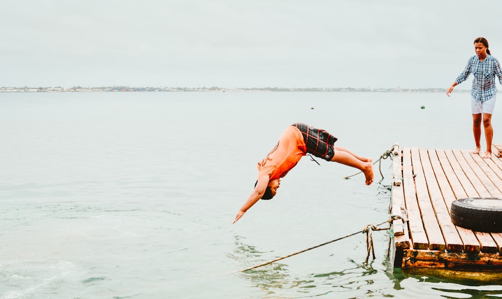 woman diving on water