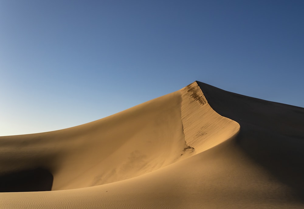sand mountain during daytime