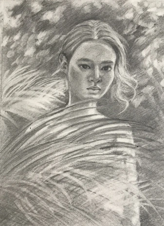 An intricate pencil sketch capturing the delicate features of a thoughtful woman with flowing hair.