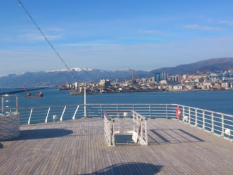 A freshly built deck overlooking Kachemak Bay with rugged mountains in the background.