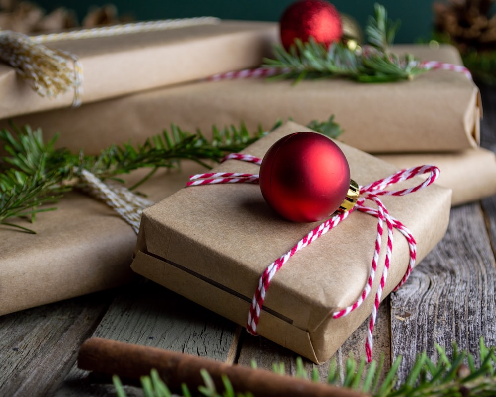 red bauble on brown giftbox