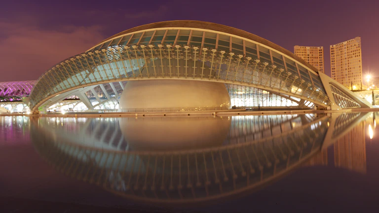 Futuristic black eye with a reflective surface showing a digital cityscape