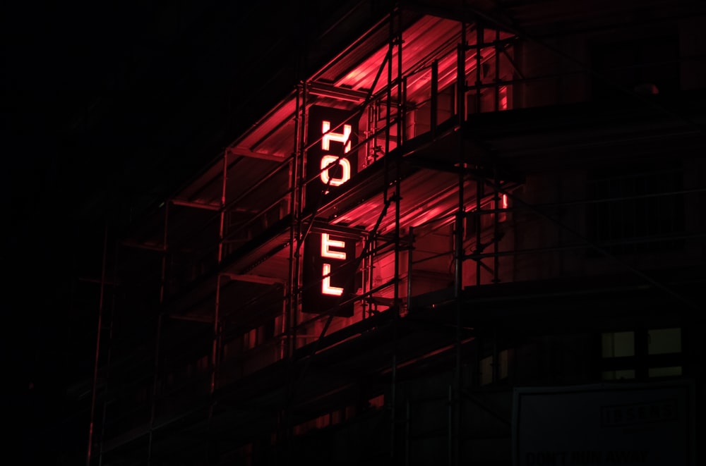 red-lighted hotel signage