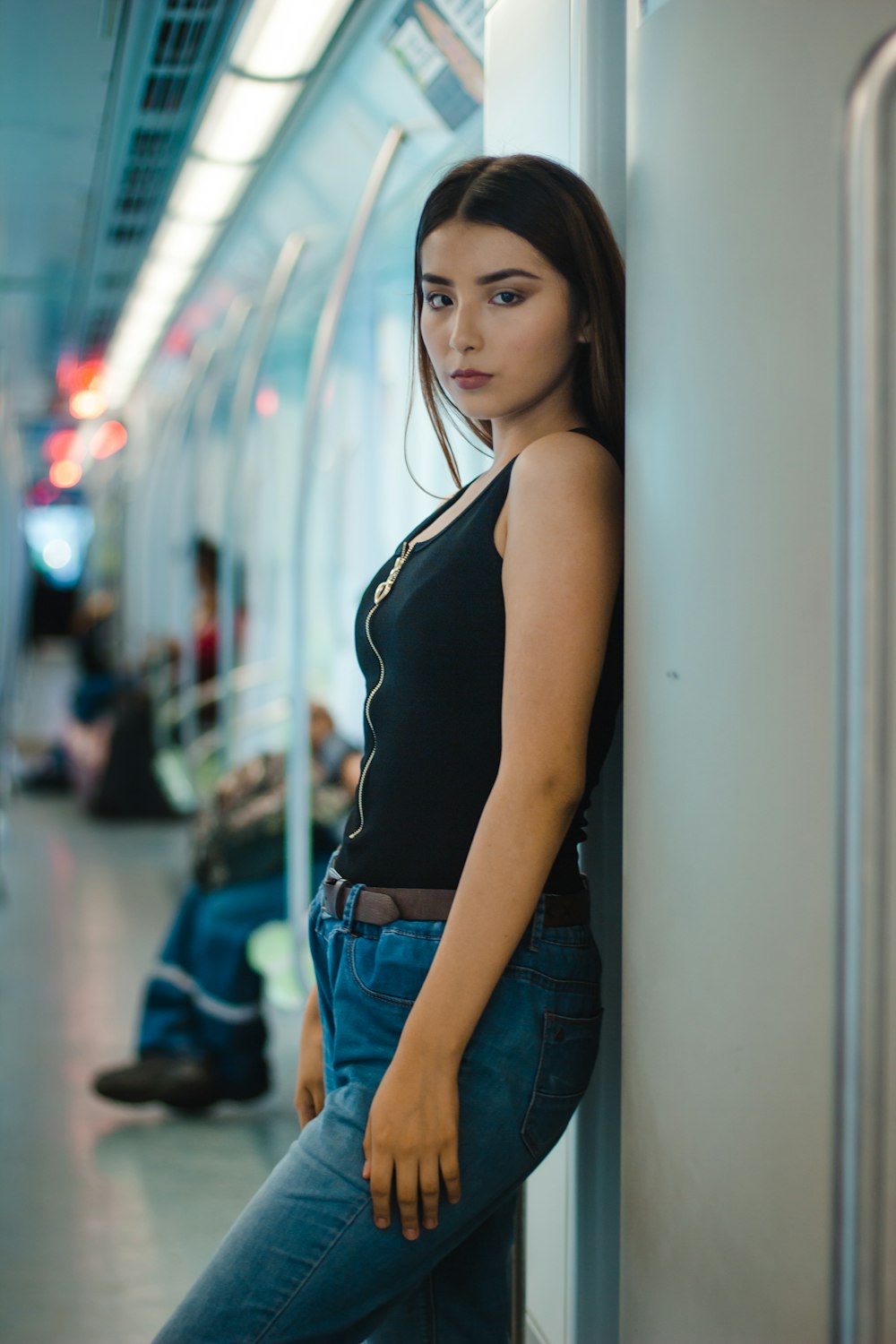 woman leaning on wall