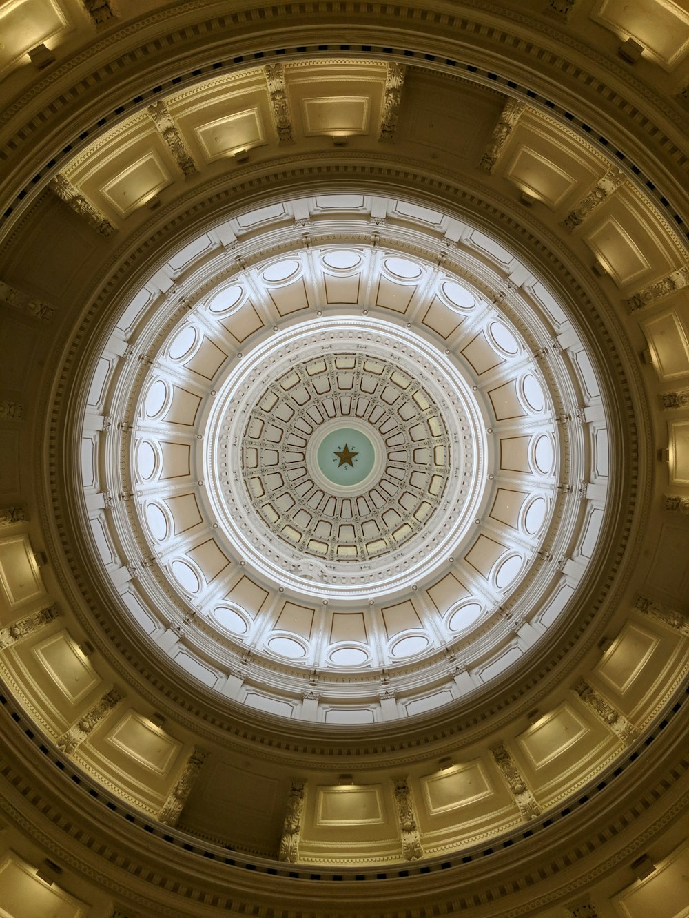 round brown,gold,and white ceiling design