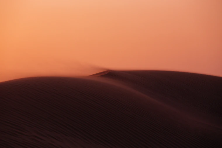 Dusky sand dune under a soft evening sky — Mikk Tõnissoo on Unsplash