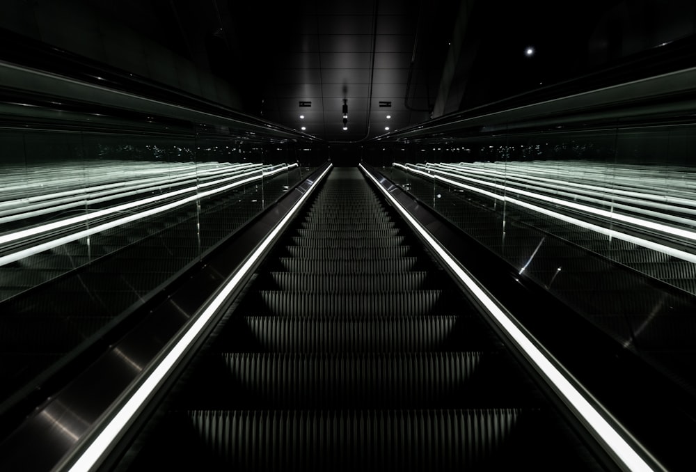 black escalator in close-up photography
