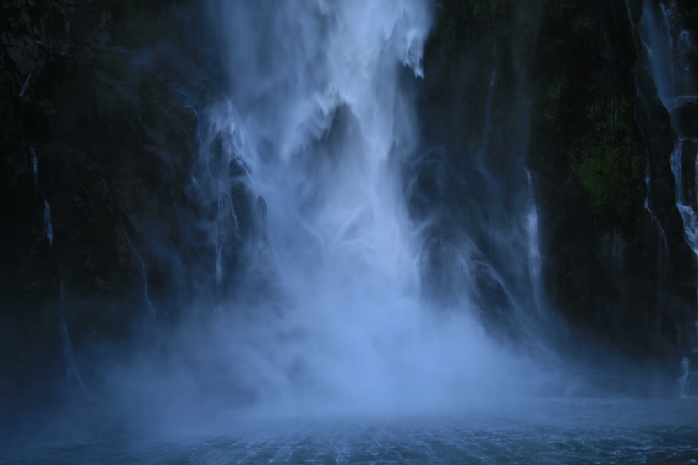 time lapse photography of waterfall