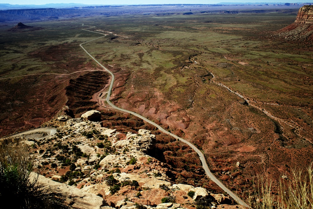 photograph of hills and plains on daylight