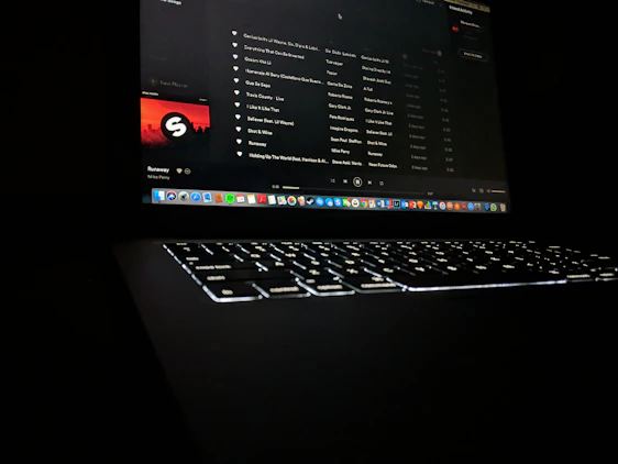 A vibrant streaming interface showing multiple playlists and video thumbnails on a sleek digital screen.