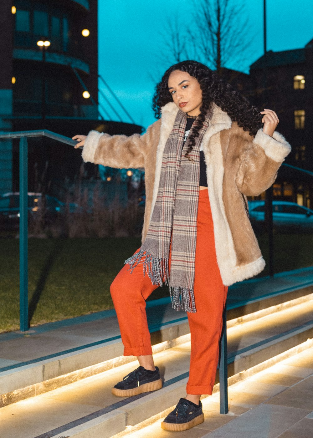 woman leaning on rail