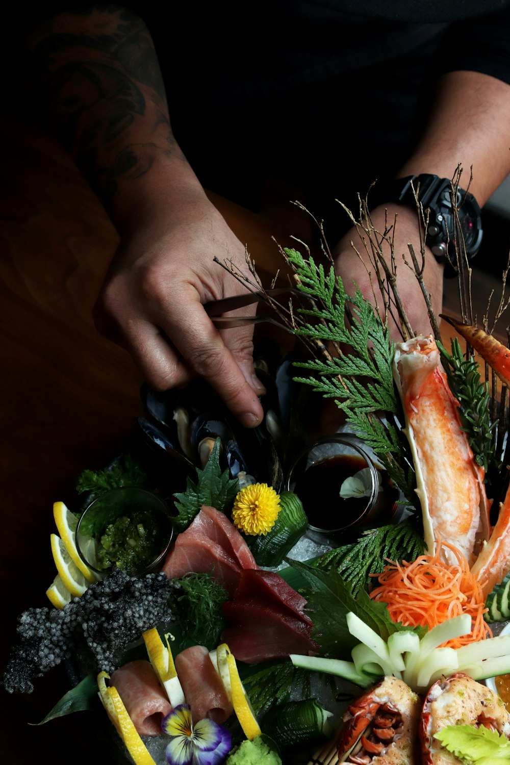 person fixing vegetables with flowers