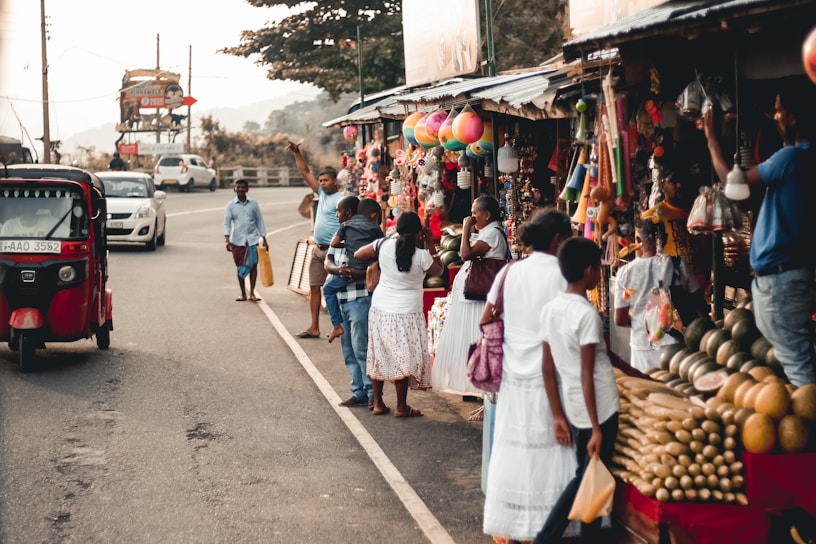 A vibrant street market in Bangkok bustling with colorful stalls and lively crowds.