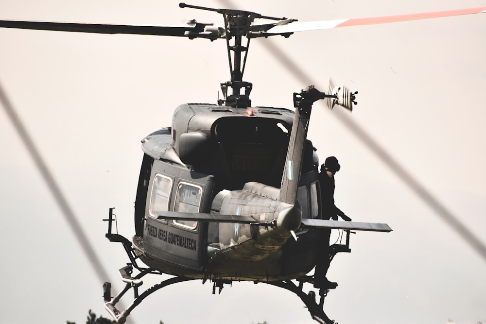 gray helicopter in close-up photography during daytime