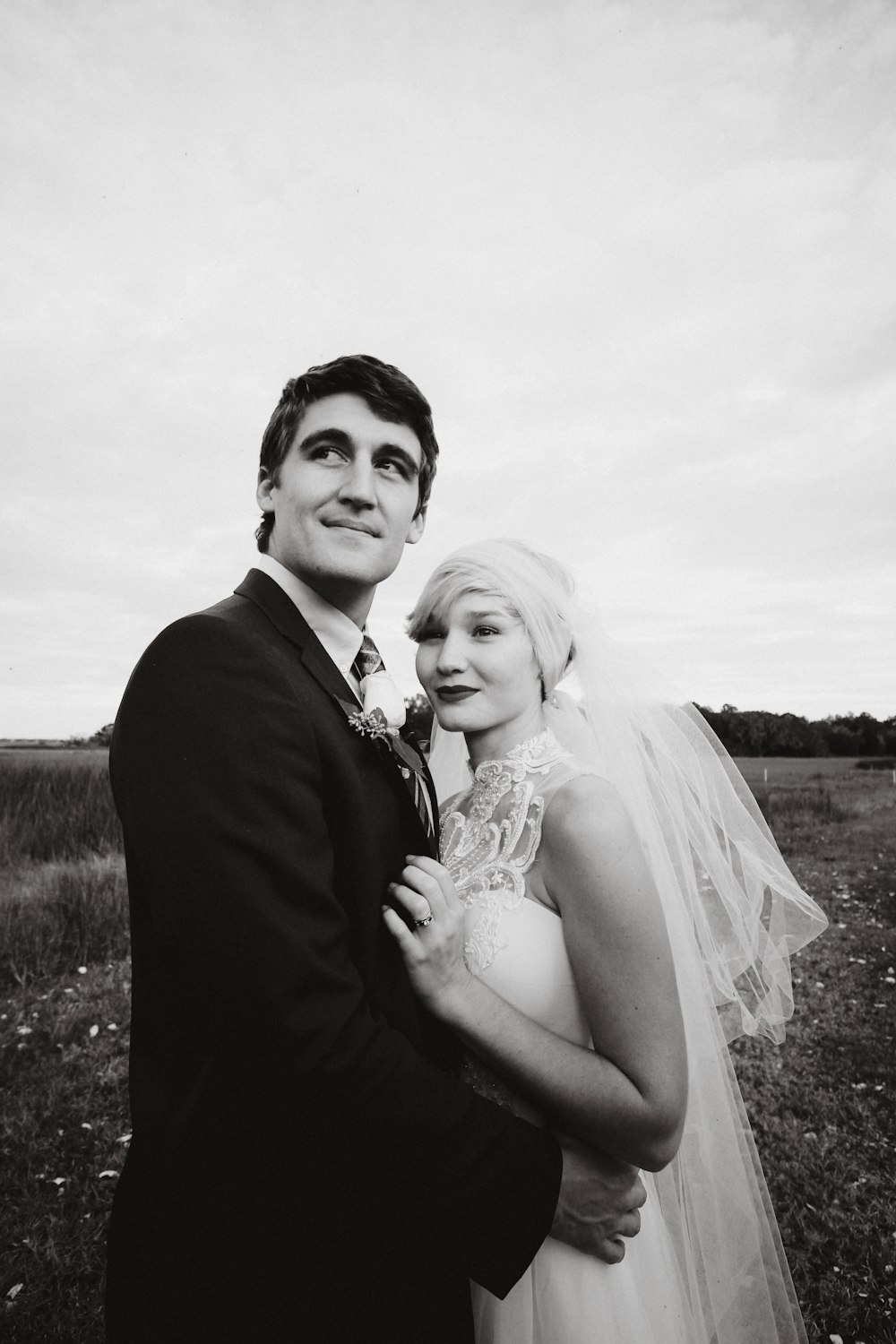 grayscale photo of bride and groom