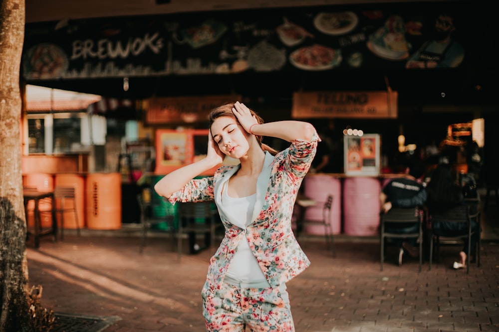 woman holding her head