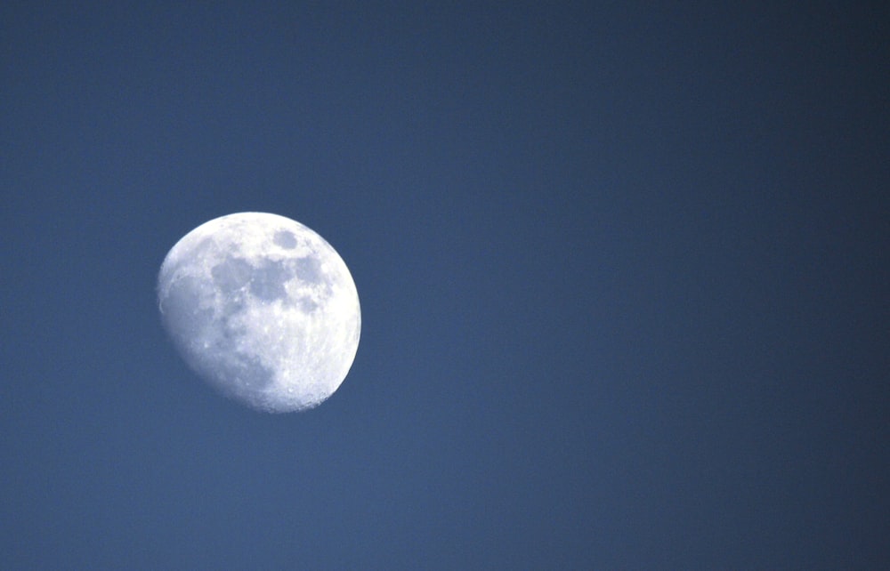 blue sky and a big moon