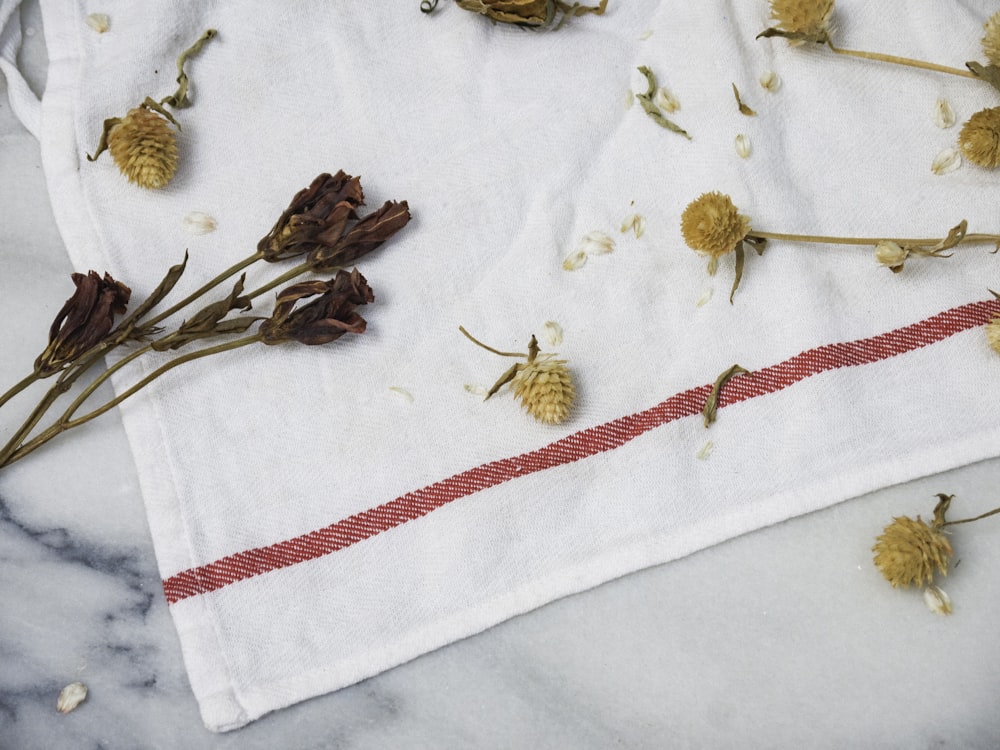 brown flower on cloth