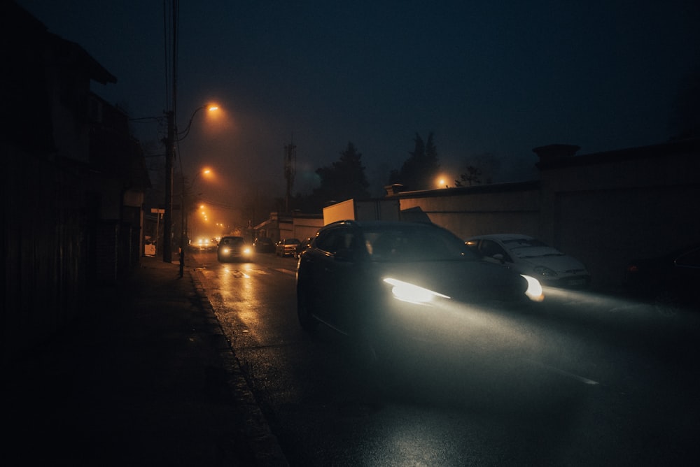 black car on road