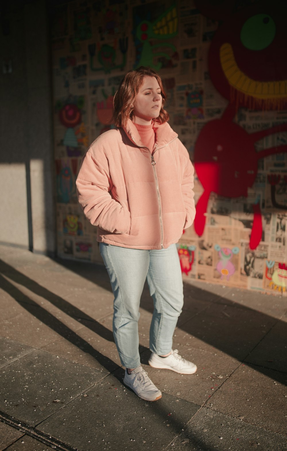 woman standing near wall